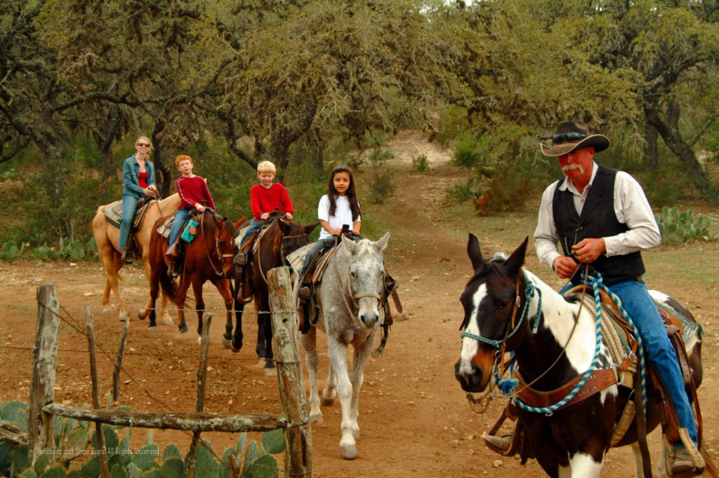 kids on a horse trail