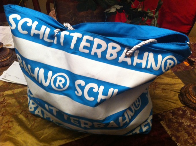schlitterbahn bag holding swimming gear