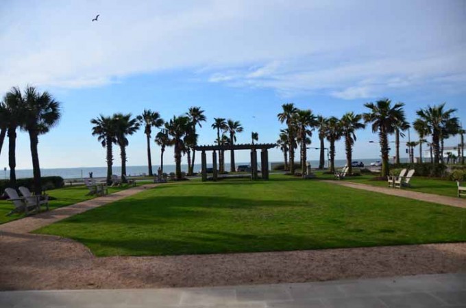 view of the beach and wedding gazebo from hotel galvez