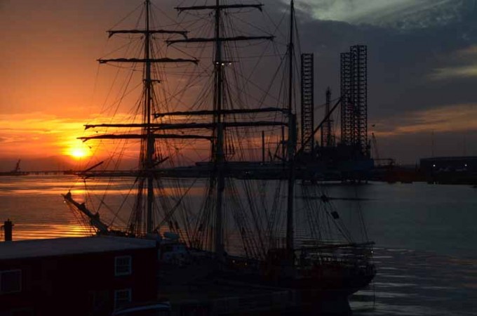 sunset over tall  ship elissa 