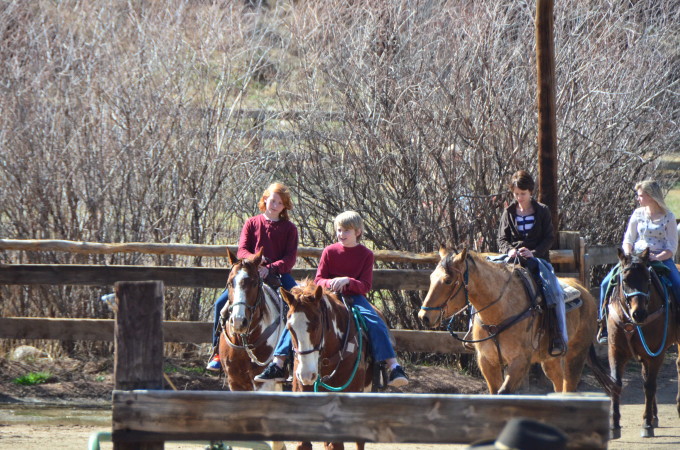 horseback riding at a dude ranch