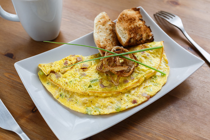 Denver omelet with fried onion on a plate