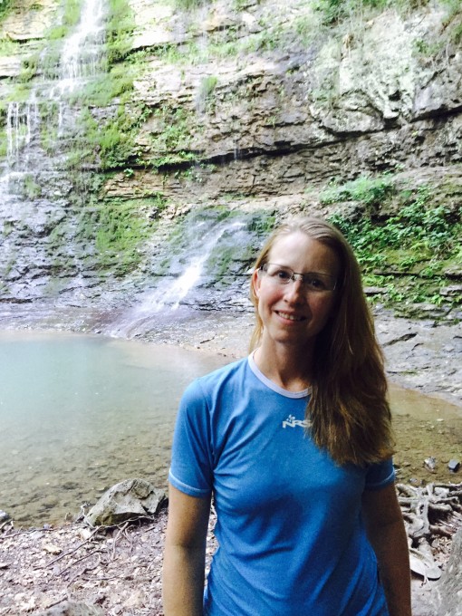 Backpack Taking a Shower in a Waterfall